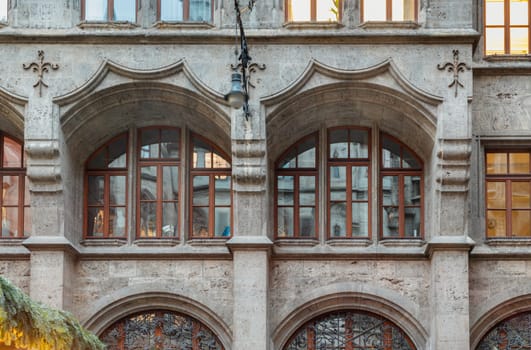 Munich, Germany - Dec 21, 2023 - Exterior architecture design details of famous New Town Hall (Neue Rathaus) on Marienplatz square in Munich. Gothic architectural style. Space for text, Selective focus.