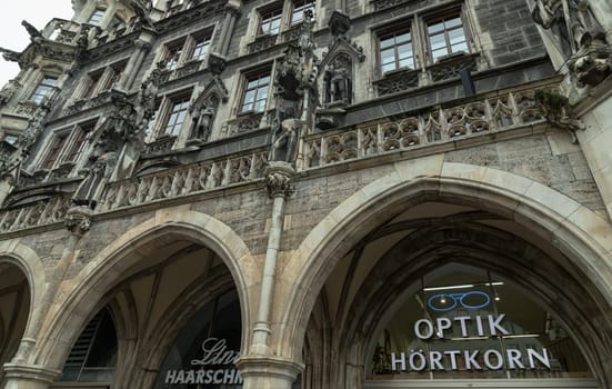 Munich, Germany - Dec 21, 2023 - Exterior architecture design details of famous New Town Hall (Neue Rathaus) on Marienplatz square in Munich. Gothic architectural style. Space for text, Selective focus.