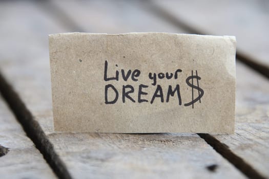 Live your dreams. Motivational quotes. Business growth concept.