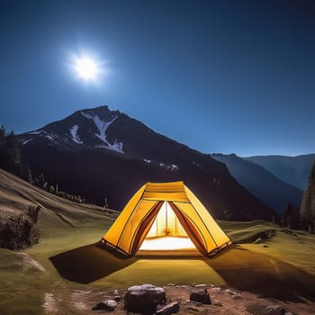 Camping tent in nature at night.