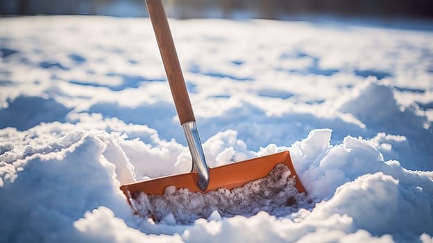 snow shovel in the snow . High quality photo