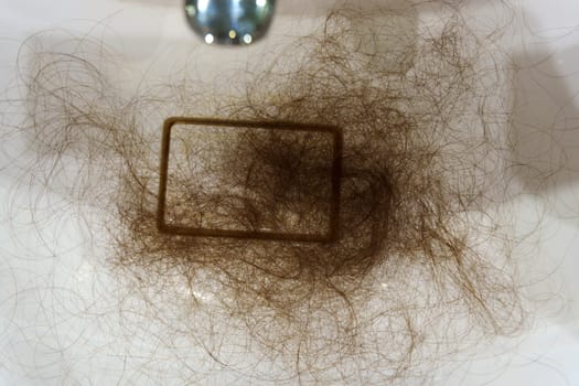 Struggles of Hair Loss. A Personal Journey confronting hair loss. Selective focus