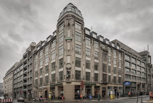 Berlin, Germany - Dec 19, 2023 - Architecture exterior of Friedrichstrasse 61 or Geschaeftsgebaeude corner (Art-deco building) in Berlin-Mitte, Copy space, Selective focus.