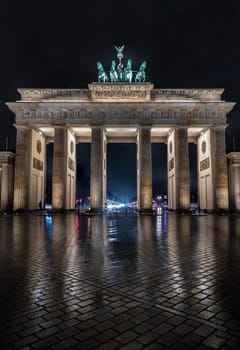 Berlin, Germany - Dec 19, 2023 - Night view of famous Brandenburger Tor (Brandenburg Gate). one of the best-known landmark and national symbols of Germany, A Tourist attraction and Meeting place, Copy space, Selective focus.