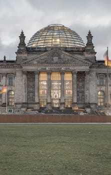 Berlin, Germany - Dec 20, 2023 - Architecture exterior of The famous Reichstag building and glass dome, meeting place of the German parliament (Deutscher Bundestag) in Berlin, Copy space, Selective focus.