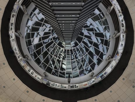 Berlin, Germany - Dec 20, 2023 - Architecture interior of the Cupola of the Reichstag dome is a glass dome constructed on top of the rebuilt Reichstag building. a major tourist attraction of the berlin city, Copy space, Selective focus.