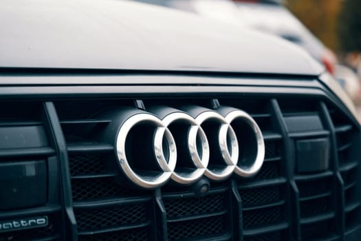 Detailed shot capturing the Audi emblem on the car's hood. BISHKEK, KYRGYZ REPUBLIC - 26 SEPTEMBER 2021