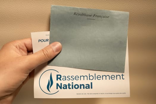 PARIS, FRANCE - JUNE 30, 2024: Ballots with the names of candidates for elections legislative Rassemblement national