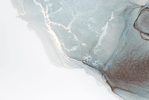 A close-up of an abstract art piece featuring a swirling blend of grey and white ink, evoking a sense of movement and fluidity.
