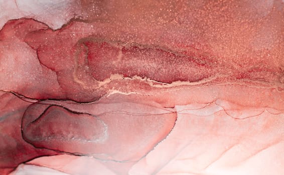 A close-up of an abstract art piece featuring swirls of crimson and rose gold ink with glittering texture.