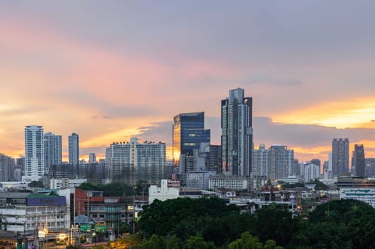 Bangkok, Thailand - May 20, 2024 - Bangkok city skyscrapers after sunset with Beautiful sky background. Gorgeous scenic of sunset with beautiful cloud and sky over metropolitan city, They can be used as Wallpaper, Space for text, Selective Focus.