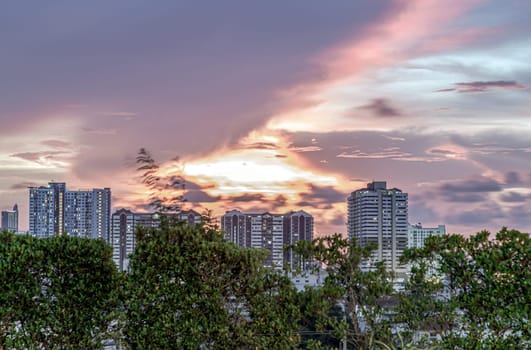 Bangkok, Thailand - May 20, 2024 - Gorgeous scenic of sunset with beautiful cloud and sky over metropolitan city. Bangkok city skyscrapers after sunset with Beautiful sky background, They can be used as Wallpaper, Copy space, Selective Focus.