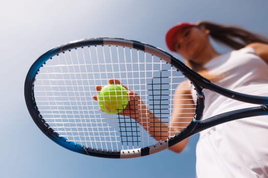 young woman playing tennis on the tennis court, olympic sport, outdoor activity concept