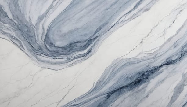 A close-up view of a light grey and white marble surface. The marble has a swirling pattern of thin, dark grey veins that create a dynamic and abstract design. The background is a light, creamy white, providing a contrast to the darker grey veins.