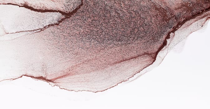A close-up photograph of a watercolor painting with swirling strokes in shades of rose and brown. The paint appears to be layered, with lighter shades on top of darker shades.