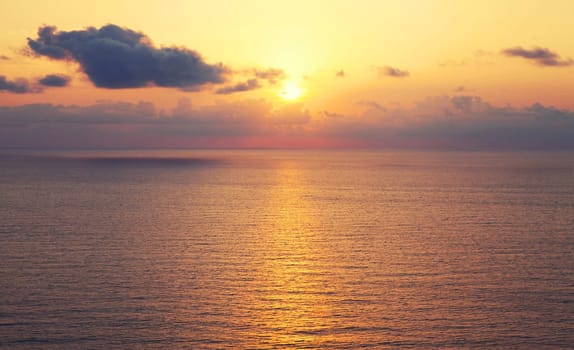 Seascape, sea landscape with bright ray of sun on the water, ripples at sunny sunset in the evening, nature background