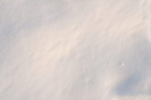 Close-up of fresh snow on a sunny day.