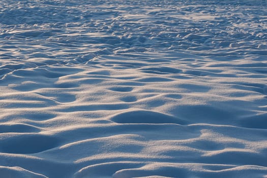 Footsteps on snow. Scenic view of snow covered land.