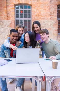 Group of students, meet on university campus work together on creative tasks, prepare for university exams, use laptop. Education, study of university life concept.