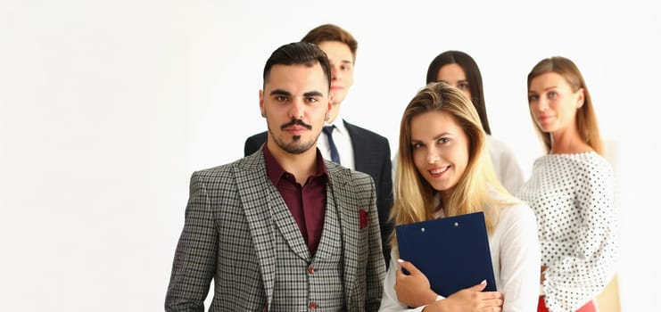 Portrait of confident team people posing for collective picture, coworkers look sharp in suits. Clever employees got deal. Business, team, career concept