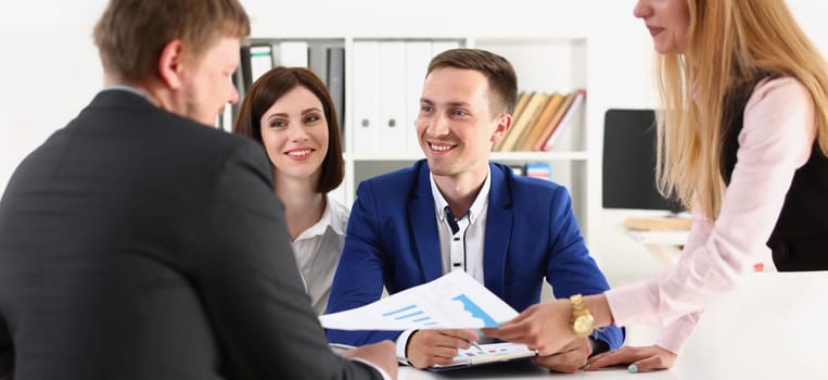 Portrait of businesspeople present product to biz partner, manager showing finance statistics. Meeting for beneficial deal, development, growth concept