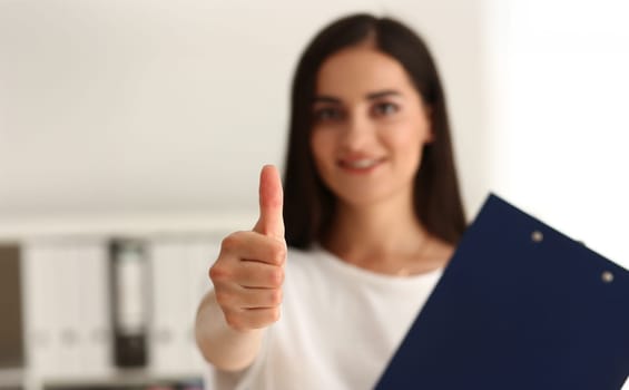 Portrait of lady show thumbs up gesture, manager hold clipboard, well done, good job symbol. Office worker support project, decision. Confirmation concept