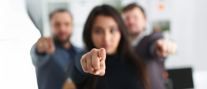 Close-up of young businesspeople pointing at you with finger, we choose you, we support you message. Partnership, work in team, business, success concept