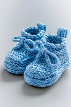 baby booties on a white background. Generative AI,
