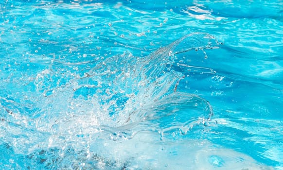 splashes of water in the pool, summer rest