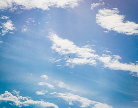 Silhouette of the MIG fighter jet in the cloudy sky