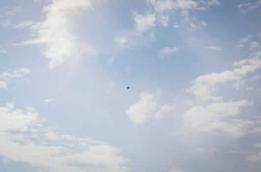 Silhouette of the MIG fighter jet in the cloudy sky