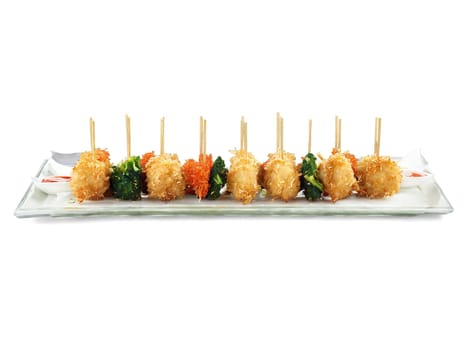 Kushiage Skewered and fried pieces of meat and vegetables with a light tempura like batter. Food isolated on transparent background.