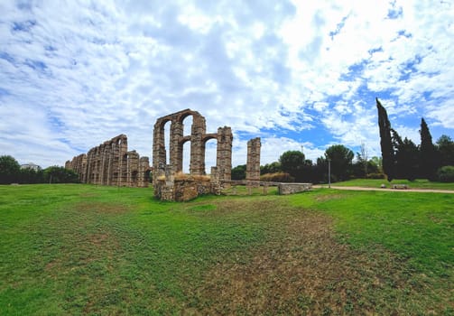 The Acueducto de los Milagros, Miraculous Aqueduct in Merida, Extremadura, Spain is a ruined Roman aqueduct bridge, part of the aqueduct built to supply water to the Roman colony of Emerita Augusta