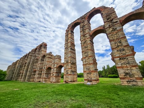 The Acueducto de los Milagros, Miraculous Aqueduct in Merida, Extremadura, Spain is a ruined Roman aqueduct bridge, part of the aqueduct built to supply water to the Roman colony of Emerita Augusta