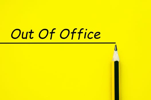 Out of Office text on yellow cover background with straight line and pencil background.