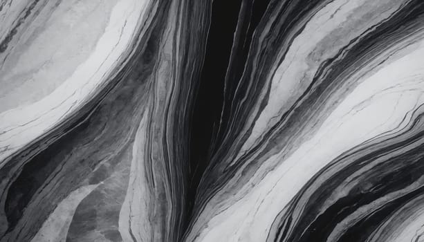 A close-up view of a black and white marble surface. The swirls and veins in the stone create a hypnotic pattern, resembling a flowing river or a celestial galaxy. The contrast between the dark and light tones is striking, giving the image a sense of depth and dimension.