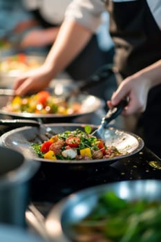 Close-up of a chef's hands putting final touches on an elegant plate