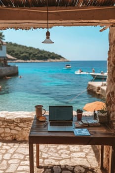 Laptop on a wooden table with a scenic sea view, perfect for remote work or a relaxing study session