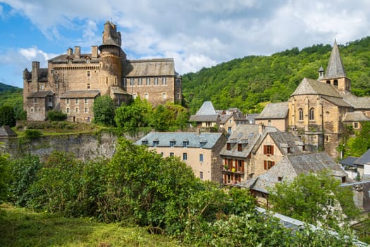 Castle and church in Estaing, one of the most beautiful villages of France, photographed in spring