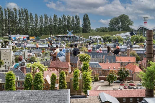 den haque,holland,9-07-2024:,Visitors enjoying the replicas of famous dutch buildings as a tourist attraction in Madurodam park buildings from all parts of the Netherlands.