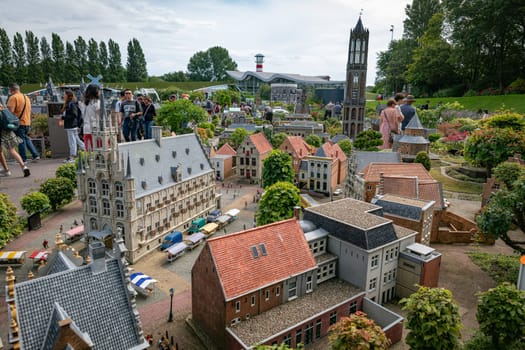 den haque,holland,9-07-2024:,Visitors enjoying the replicas of famous dutch buildings as a tourist attraction in Madurodam park buildings from all parts of the Netherlands.