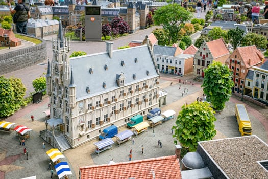 den haque,holland,9-07-2024:,Visitors enjoying the replicas of famous dutch buildings as a tourist attraction in Madurodam park buildings from all parts of the Netherlands.