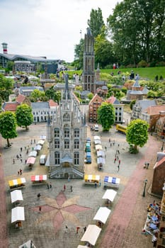 den haque,holland,9-07-2024:,Visitors enjoying the replicas of famous dutch buildings as a tourist attraction in Madurodam park buildings from all parts of the Netherlands.