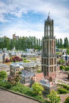den haque,holland,9-07-2024:,Visitors enjoying the replicas of famous dutch buildings as a tourist attraction in Madurodam park buildings from all parts of the Netherlands.