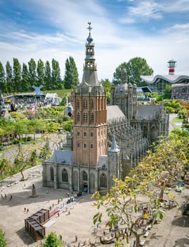 den haque,holland,9-07-2024:,Visitors enjoying the replicas of famous dutch buildings as a tourist attraction in Madurodam park buildings from all parts of the Netherlands.