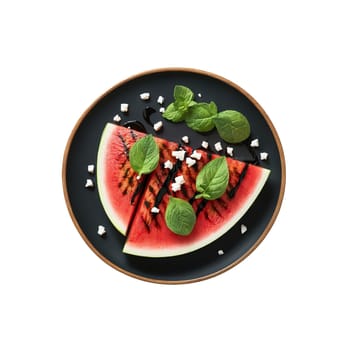 Grilled watermelon with feta cheese balsamic glaze and mint leaves on a clear plate Summer. close-up food, isolated on transparent background
