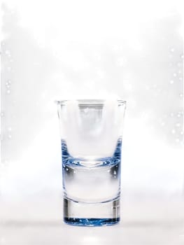 Finnish Koskenkorva Shot glass with the famous Finnish vodka known for its purity and smooth. Drink isolated on transparent background.