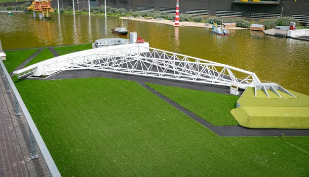den haque,holland,9-07-2024:,the maesland barrier, part of the dutch delta works replica as a tourist attraction in Madurodam park buildings from all parts of the Netherlands.