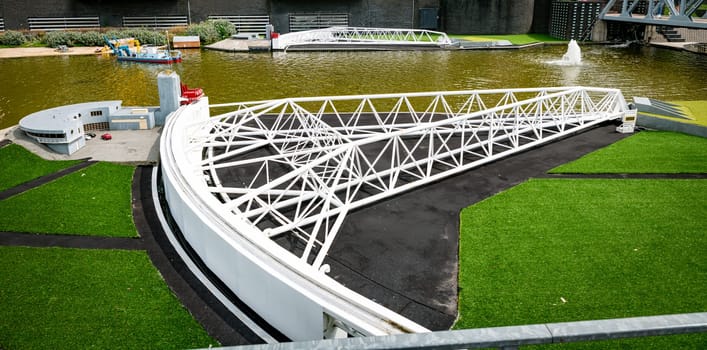 den haque,holland,9-07-2024:,the maesland barrier, part of the dutch delta works replica as a tourist attraction in Madurodam park buildings from all parts of the Netherlands.