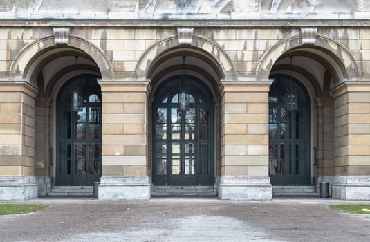 Munich, Germany - Dec 21, 2023 - Arched entrance of The Munich Residence. Architectural detail of Renaissance baroque style, Space for text, Selective focus.